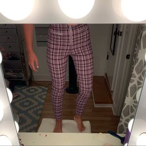 Pink houndstooth pants with zipper details